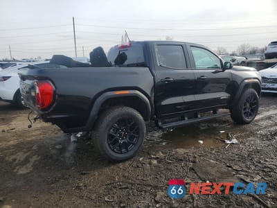 Trzecie zdjęcie samochodu z tyłu: 2025 GMC CANYON AT4 VIN:1GTP2DEK2S1242957 - miniatura