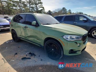Czwarte zdjęcie samochodu z boku: 2014 BMW X5 SDRIVE35I VIN:5UXKR2C59E0H31603 - miniatura