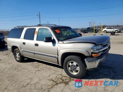 Czwarte zdjęcie samochodu z boku: 2001 CHEVROLET SUBURBAN C1500 VIN:3GNEC16T91G174318 - miniatura