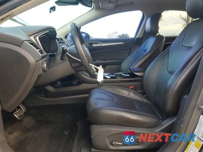 Zdjęcie 7 z 12 samochodu: 2014 FORD FUSION TITANIUM HEV VIN:3FA6P0RU5ER379103 - miniatura