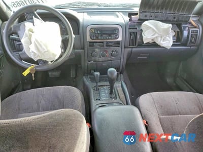 Zdjęcie 8 z 13 samochodu: 2001 JEEP GRAND CHEROKEE LAREDO VIN:1J4GW48S61C694679 - miniatura