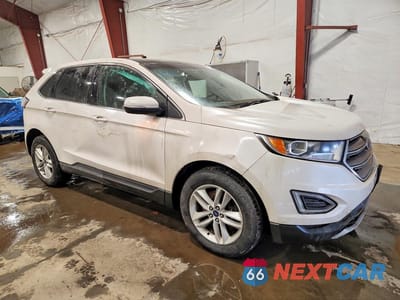 Czwarte zdjęcie samochodu z boku: 2016 FORD EDGE SEL VIN:2FMPK4J91GBC39459 - miniatura