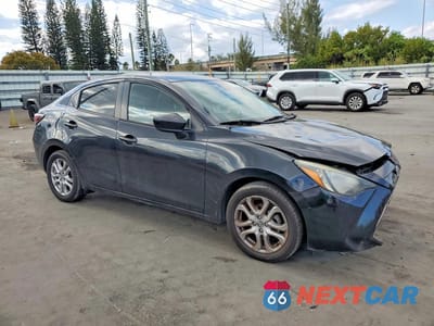 Czwarte zdjęcie samochodu z boku: 2016 TOYOTA SCION IA VIN:3MYDLBZV3GY106091 - miniatura