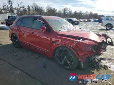 Czwarte zdjęcie samochodu z boku: 2018 BENTLEY BENTAYGA VIN:SJAAC2ZVXJC020098 - miniatura