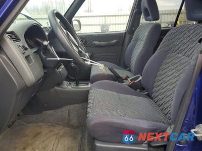 Zdjęcie 7 z 13 samochodu: 2000 TOYOTA RAV4 VIN:JT3GP10V5Y0044202 - miniatura