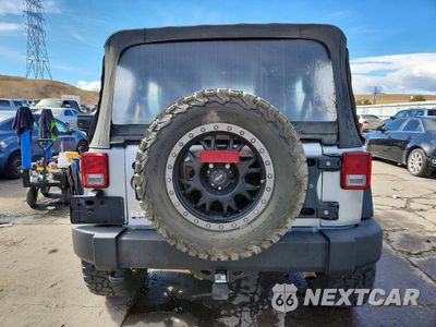 Zdjęcie 6 z 14 samochodu: 2013 JEEP WRANGLER UNLIMITED SPORT VIN:1C4BJWDG0DL669440 - miniatura