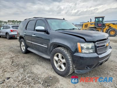 Czwarte zdjęcie samochodu z boku: 2014 CHEVROLET TAHOE C1500 LTZ VIN:1GNSCCE01ER156553 - miniatura