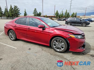 Czwarte zdjęcie samochodu z boku: 2019 TOYOTA CAMRY HYBRID LE VIN:4T1B31HK3KU512161 - miniatura