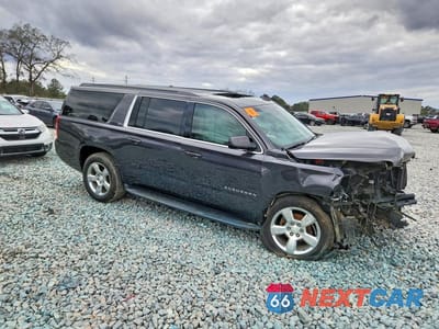 Czwarte zdjęcie samochodu z boku: 2017 CHEVROLET SUBURBAN C1500 LT VIN:1GNSCHKC4HR290151 - miniatura