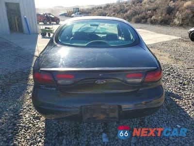 Zdjęcie 6 z 12 samochodu: 1999 FORD TAURUS SE VIN:1FAFP53UXXG229925 - miniatura