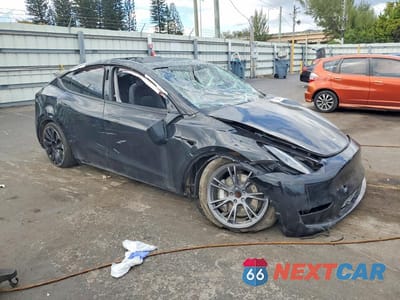 Czwarte zdjęcie samochodu z boku: 2024 TESLA MODEL Y VIN:7SAYGDED6RF206541 - miniatura