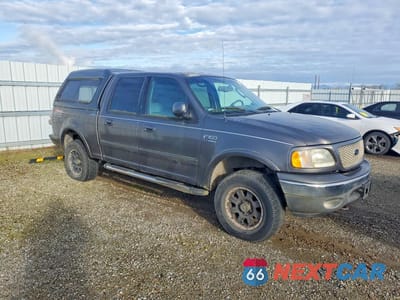 Czwarte zdjęcie samochodu z boku: 2002 FORD F150 SUPERCREW VIN:1FTRW08L32KC49808 - miniatura