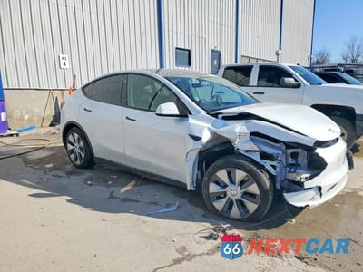Czwarte zdjęcie samochodu z boku: 2023 TESLA MODEL Y VIN:7SAYGDEE0PF612059 - miniatura
