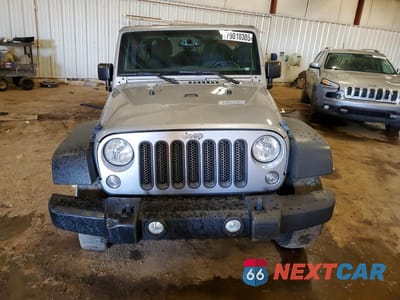 Piąte zdjęcie samochodu w środku: 2016 JEEP WRANGLER UNLIMITED SPORT VIN:1C4BJWDG8GL329666 - miniatura