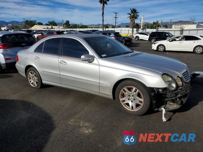 Czwarte zdjęcie samochodu z boku: 2003 MERCEDES-BENZ E 320 VIN:WDBUF65J23A126619 - miniatura