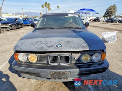 Piąte zdjęcie samochodu w środku: 1988 BMW 3 SERIES VIN:WBAHD2314MBF72092 - miniatura