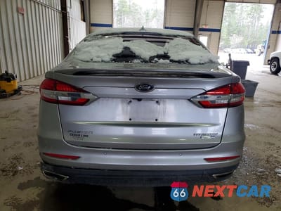 Zdjęcie 6 z 11 samochodu: 2020 FORD FUSION TITANIUM VIN:3FA6P0D96LR115436 - miniatura