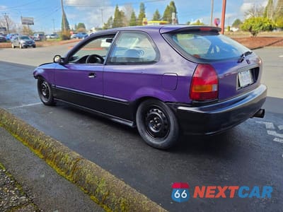 Trzecie zdjęcie samochodu z tyłu: 1999 HONDA CIVIC DX VIN:2HGEJ6448XH107081 - miniatura