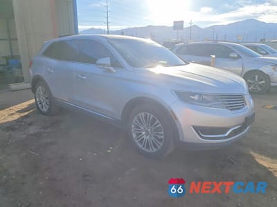 Czwarte zdjęcie samochodu z boku: 2018 LINCOLN MKX RESERVE VIN:2LMPJ8LR5JBL41284 - miniatura