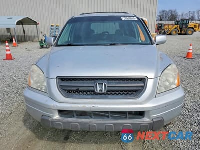 Piąte zdjęcie samochodu w środku: 2003 HONDA PILOT VIN:2HKYF18523H601151 - miniatura