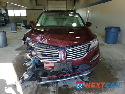 Piąte zdjęcie samochodu w środku: 2017 LINCOLN MKC RESERVE VIN:5LMCJ3D99HUL54620 - miniatura