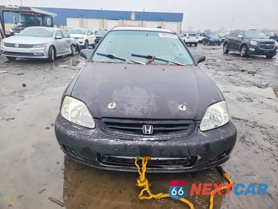 Piąte zdjęcie samochodu w środku: 1999 HONDA CIVIC CX VIN:2HGEJ6323XH110387 - miniatura