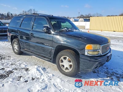 Czwarte zdjęcie samochodu z boku: 2004 GMC YUKON DENALI VIN:1GKEK63UX4J290303 - miniatura