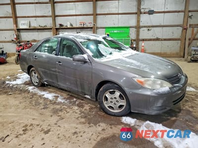 Czwarte zdjęcie samochodu z boku: 2003 TOYOTA CAMRY LE VIN:4T1BF32K53U548219 - miniatura