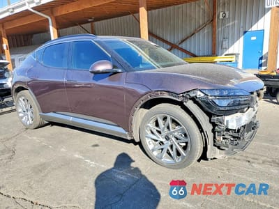 Czwarte zdjęcie samochodu z boku: 2024 GENESIS GV60 ADVANCED VIN:KMUKCDSC2RU022275 - miniatura