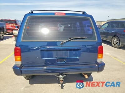 Zdjęcie 6 z 12 samochodu: 2001 JEEP CHEROKEE SPORT VIN:1J4FT48S41L588073 - miniatura