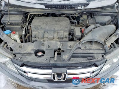 Zdjęcie 12 z 13 samochodu: 2017 HONDA ODYSSEY TOURING VIN:5FNRL5H91HB016137 - miniatura