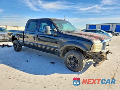 Czwarte zdjęcie samochodu z boku: 2002 FORD F250 SUPER DUTY VIN:1FTNW20F02ED35317 - miniatura