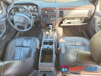 Zdjęcie 8 z 13 samochodu: 2001 JEEP GRAND CHEROKEE LIMITED VIN:1J4GX58N51C628797 - miniatura