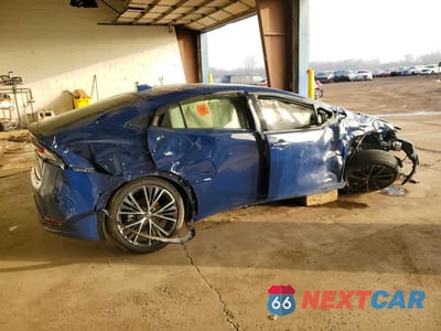 Trzecie zdjęcie samochodu z tyłu: 2025 TOYOTA PRIUS LE VIN:JTDACAAU3S3058348 - miniatura