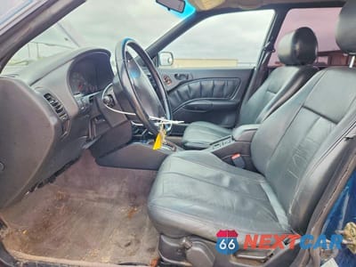 Zdjęcie 7 z 11 samochodu: 1999 SUBARU LEGACY OUTBACK VIN:4S3BG685XX7605085 - miniatura