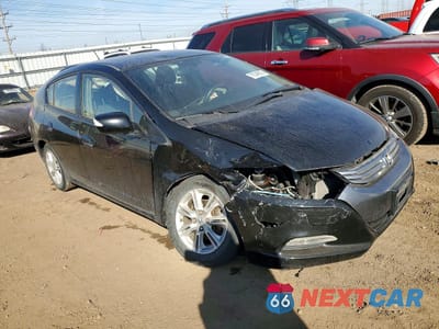 Czwarte zdjęcie samochodu z boku: 2011 HONDA INSIGHT EX VIN:JHMZE2H78BS000582 - miniatura