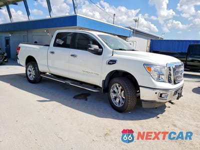 Czwarte zdjęcie samochodu z boku: 2017 NISSAN TITAN XD SL VIN:1N6AA1F21HN552134 - miniatura