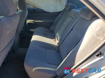 Zdjęcie 10 z 11 samochodu: 2003 TOYOTA CAMRY LE VIN:4T1BE30KX3U157590 - miniatura