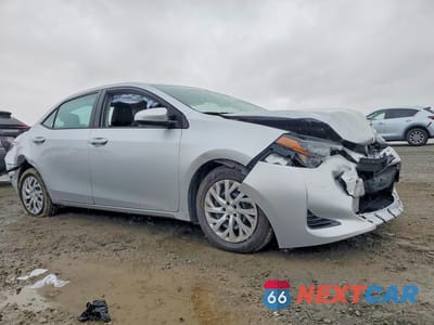 Czwarte zdjęcie samochodu z boku: 2017 TOYOTA COROLLA L VIN:5YFBURHE2HP613904 - miniatura