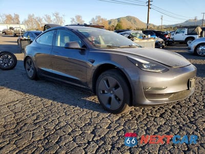 Czwarte zdjęcie samochodu z boku: 2023 TESLA MODEL 3 VIN:5YJ3E1EAXPF687277 - miniatura