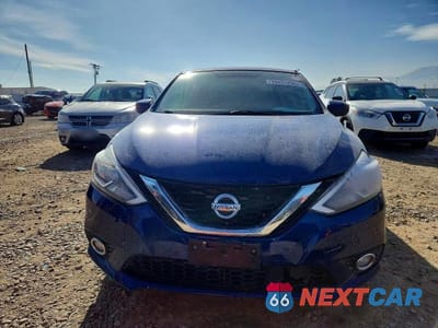 Piąte zdjęcie samochodu w środku: 2018 NISSAN SENTRA S VIN:3N1AB7AP3JL641962 - miniatura