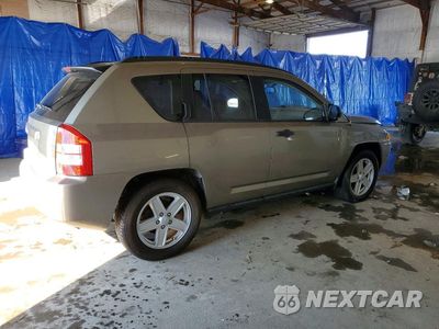 Trzecie zdjęcie samochodu z tyłu: 2010 JEEP COMPASS VIN:1J8FT47W07D204313 - miniatura
