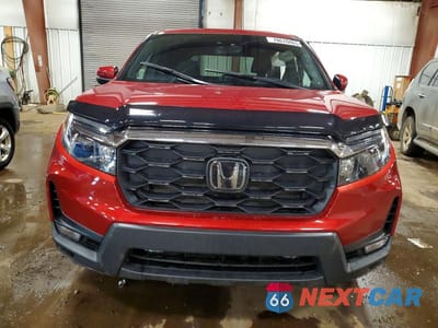 Piąte zdjęcie samochodu w środku: 2023 HONDA PASSPORT EXL VIN:5FNYF8H56PB044175 - miniatura