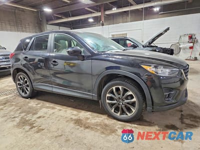 Czwarte zdjęcie samochodu z boku: 2016 MAZDA CX-5 GT VIN:JM3KE4DY2G0636857 - miniatura