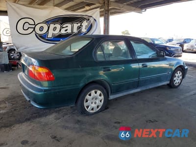Trzecie zdjęcie samochodu z tyłu: 1999 HONDA CIVIC BASE VIN:2HGEJ661XXH559522 - miniatura