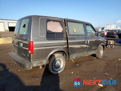 Trzecie zdjęcie samochodu z tyłu: 1999 CHEVROLET ASTRO VIN:1GBDM19W9XB154499 - miniatura