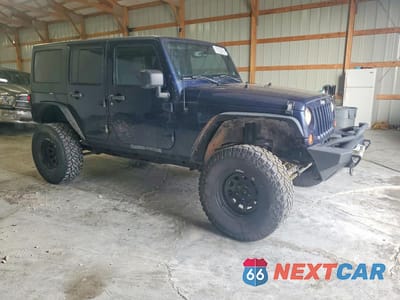 Czwarte zdjęcie samochodu z boku: 2013 JEEP WRANGLER UNLIMITED SPORT VIN:1C4BJWDG5DL558558 - miniatura