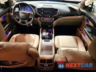 Zdjęcie 8 z 13 samochodu: 2021 HONDA PILOT TOURING VIN:5FNYF6H60MB034928 - miniatura