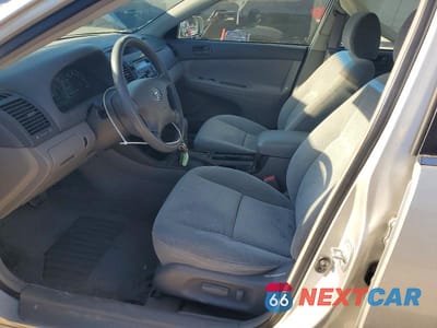 Zdjęcie 7 z 11 samochodu: 2003 TOYOTA CAMRY LE VIN:4T1BE30KX3U157590 - miniatura