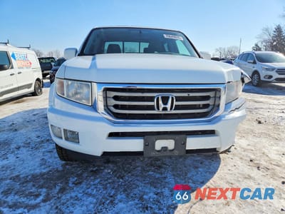 Piąte zdjęcie samochodu w środku: 2014 HONDA RIDGELINE RTL VIN:5FPYK1F54EB001920 - miniatura
